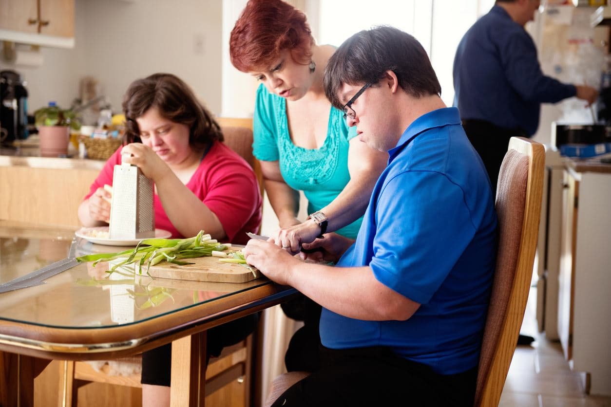 Caregiver providing support to a young adult
